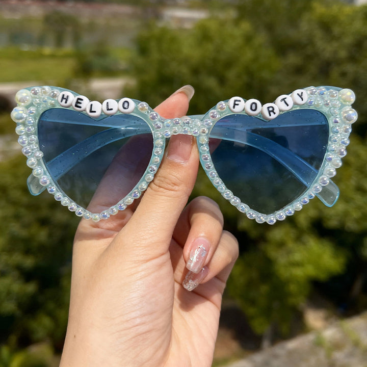 Perlenverzierte Cat-Eye-Sonnenbrille Karnz