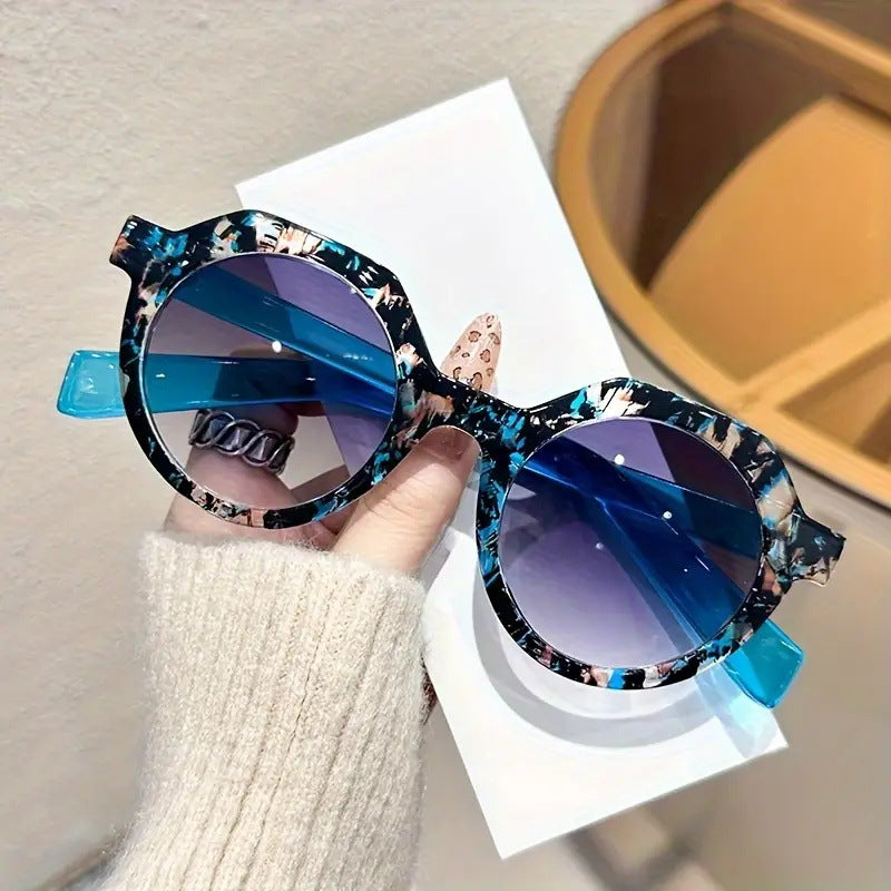 Damen extravagante runde Sonnenbrille mit farblich akzentuiertem Rahmen Karnz