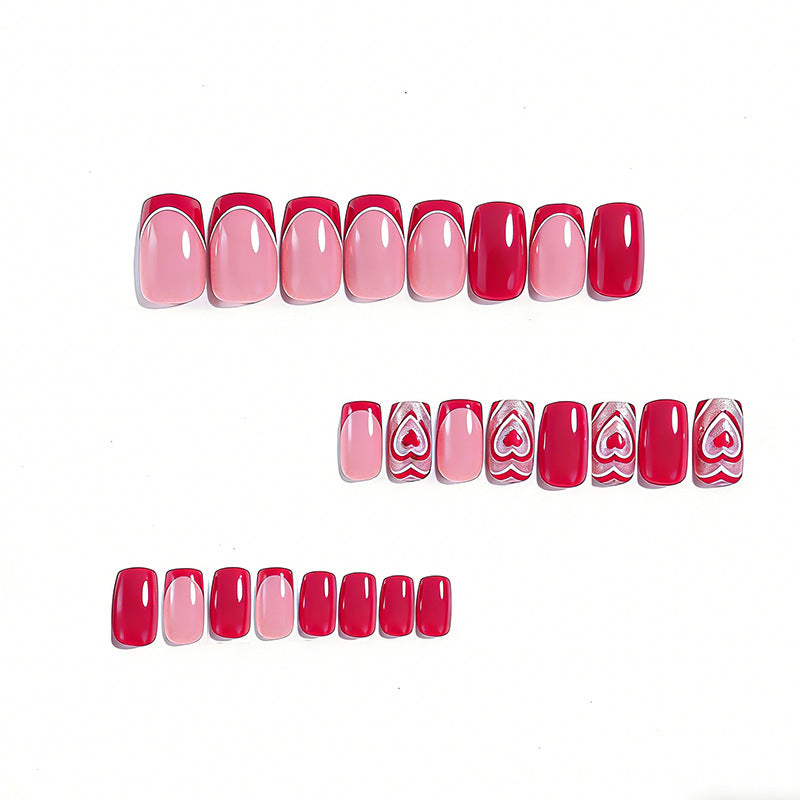Herz-verzierte Nagelkunst Karnz