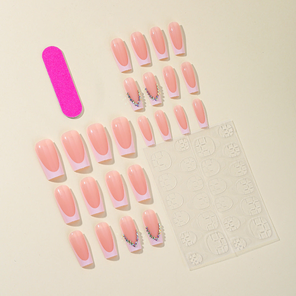 Elegante French Tip Acryl-Nagelerweiterungen mit Strassakzenten Karnz