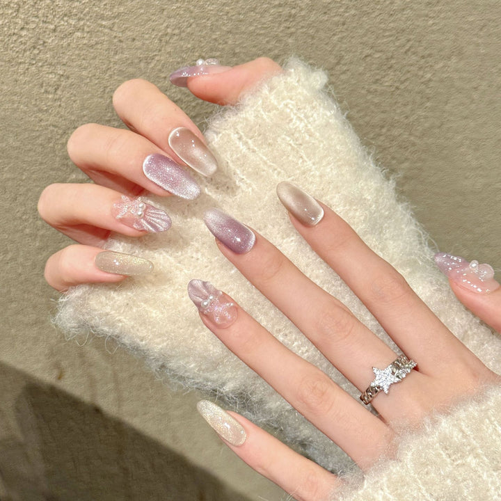 Elegantes dekoratives Press-On-Nagelkunstset mit Perlen- und Glitzerakzenten