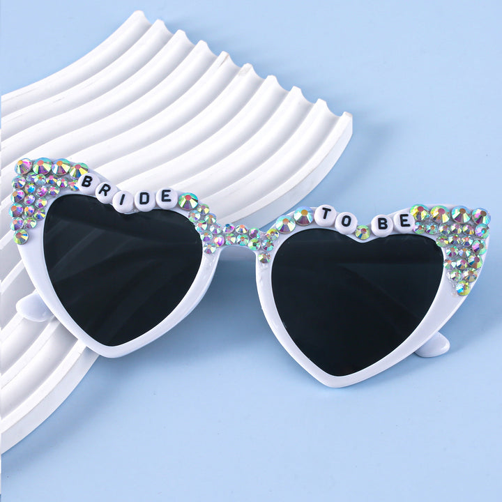 Damen Herzförmige Sonnenbrille mit außergewöhnlichem Dekor Karnz