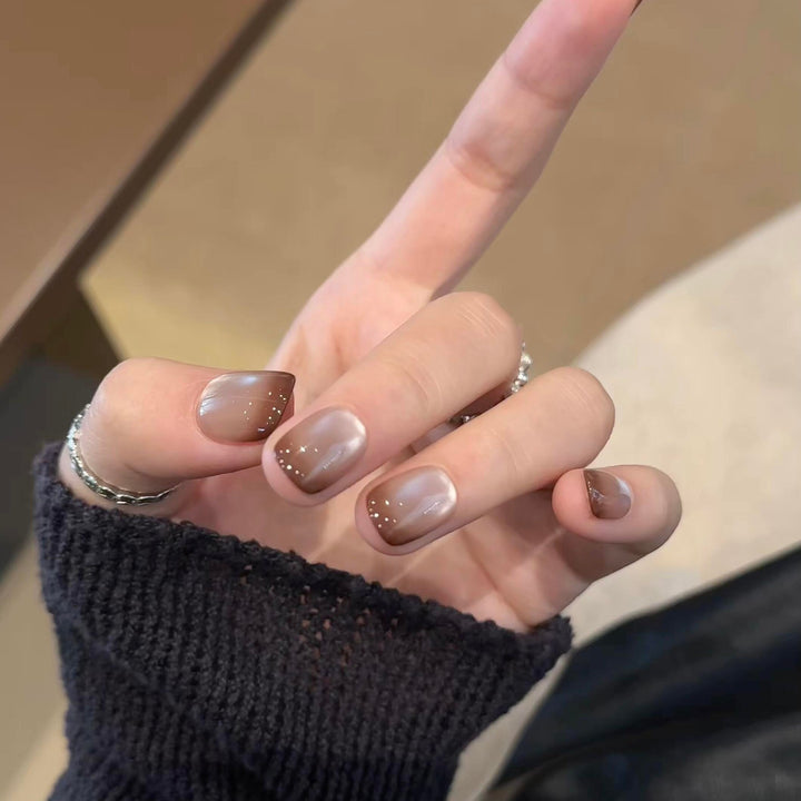 Kunstnägel mit Elegantem Farbverlauf und Glitzerelementen Karnz