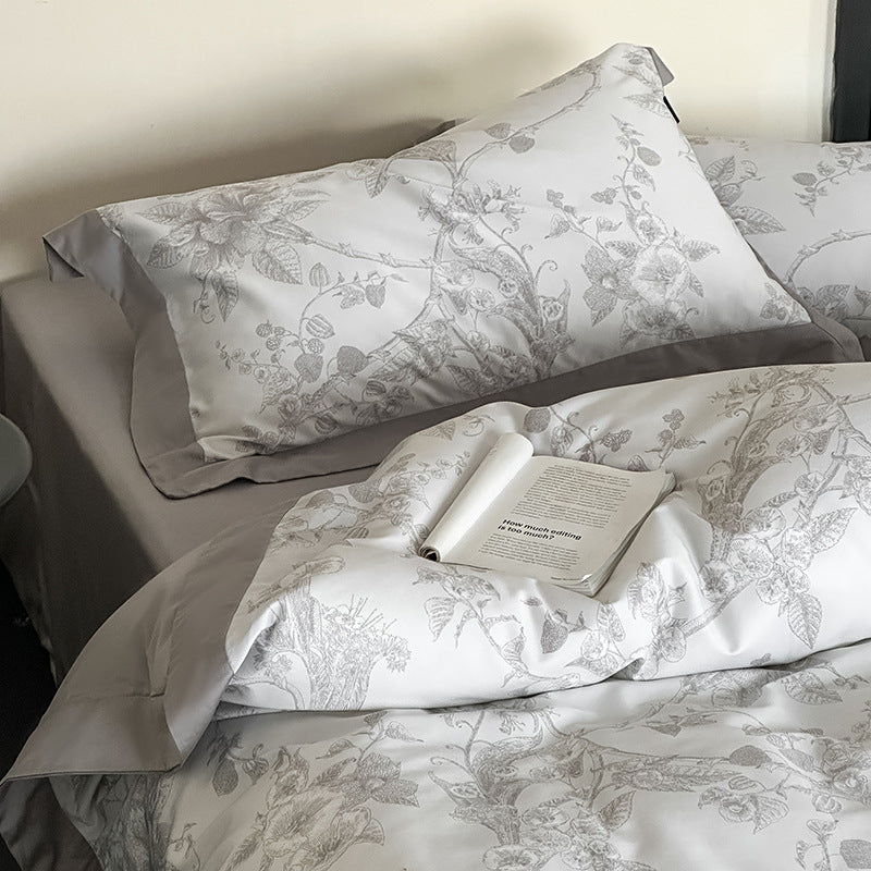Exklusive Baumwollsatin-Bettwäschegarnitur mit floraler Jacquardstruktur und Wendefunktion