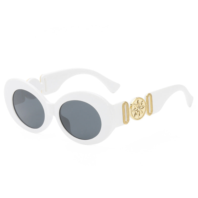 Damen modische Sonnenbrille mit auffälligen goldenen Akzenten Karnz