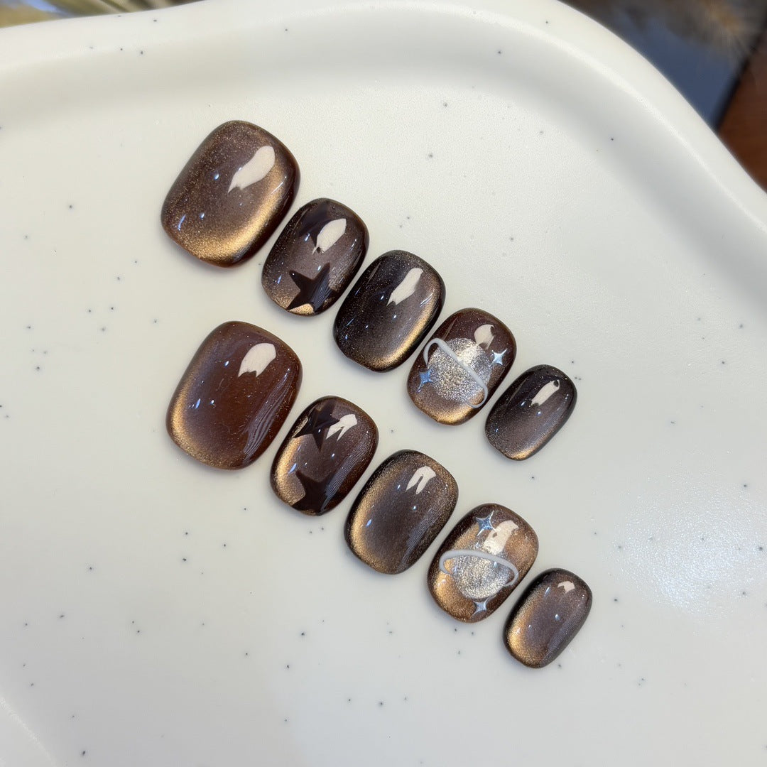 Kunstnagelset mit Sternen- und Planetendesign Karnz