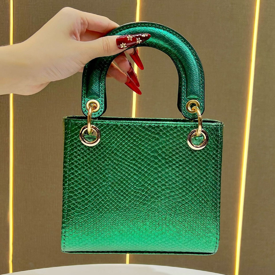 Stylische Schlangenleder-texturierte Handtasche