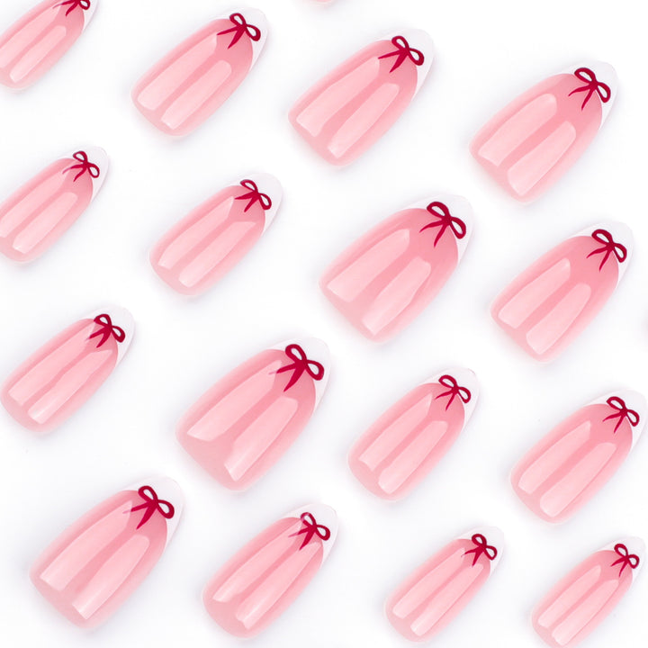 Elegante Nailart mit Schleifen-Design Karnz