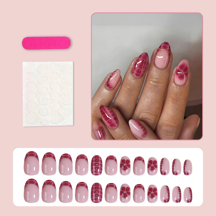 Kunstnagelset mit kreativen Blüten- und Rautenmustern Karnz