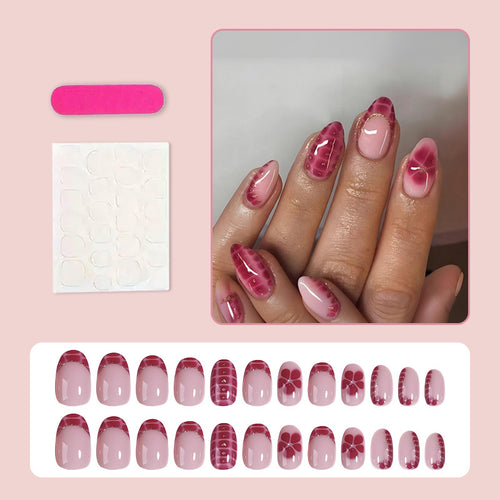 Kunstnagelset mit kreativen Blüten- und Rautenmustern Karnz