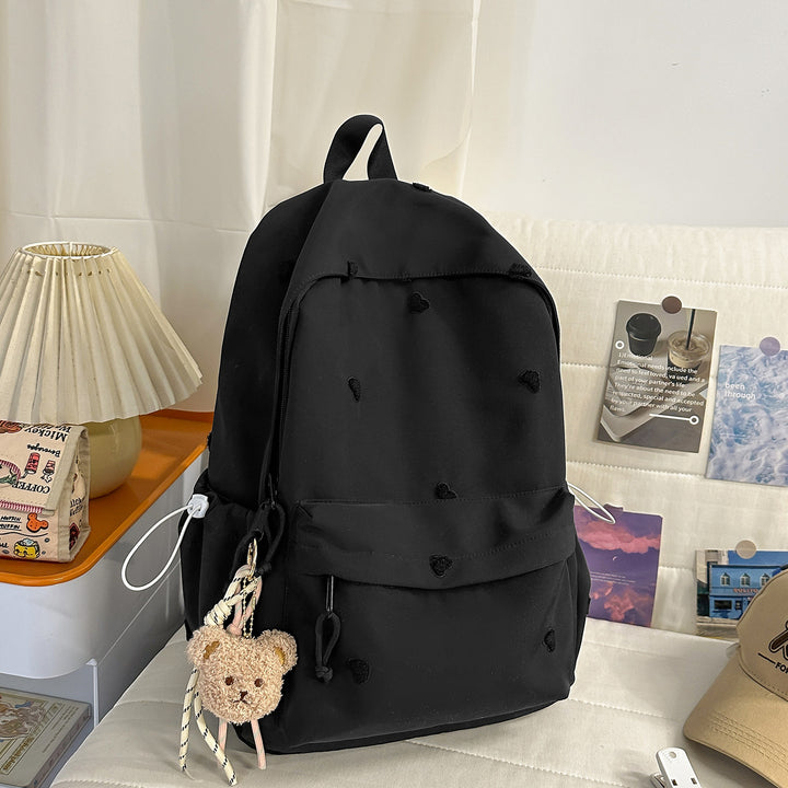 Vielseitiger lässiger Rucksack mit lustigem Charakteranhänger Karnz