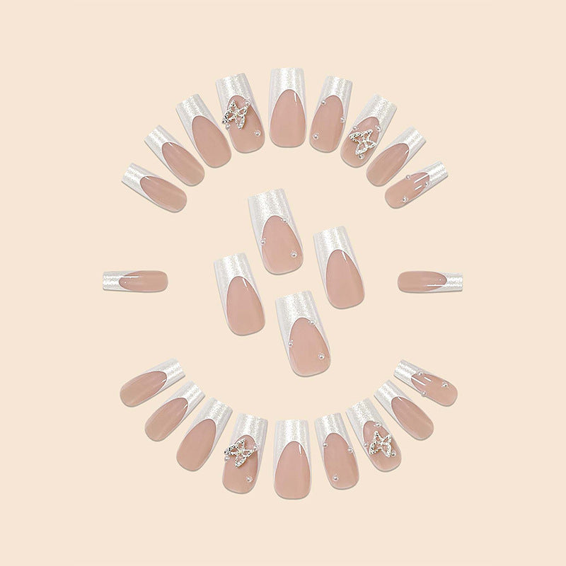 Verschnörkelte Schmetterlings-Nagelkunstverlängerungen