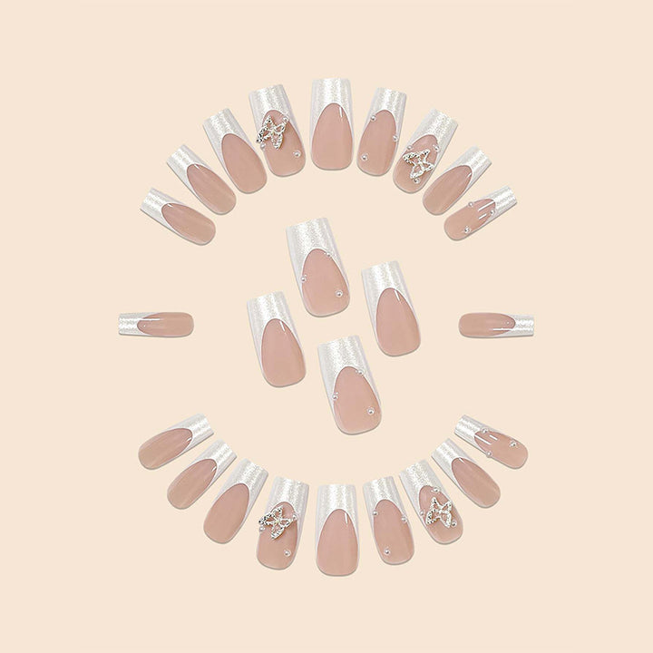 Verschnörkelte Schmetterlings-Nagelkunstverlängerungen