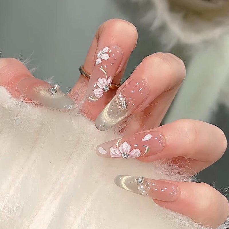 Kunstnagelset mit eleganten Glitzer-Akzenten Karnz