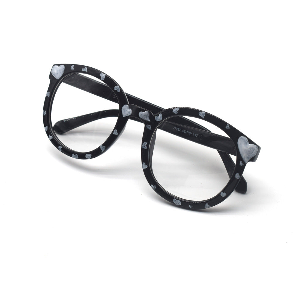 Trendige herzbedruckte Katzenaugenbrille Karnz