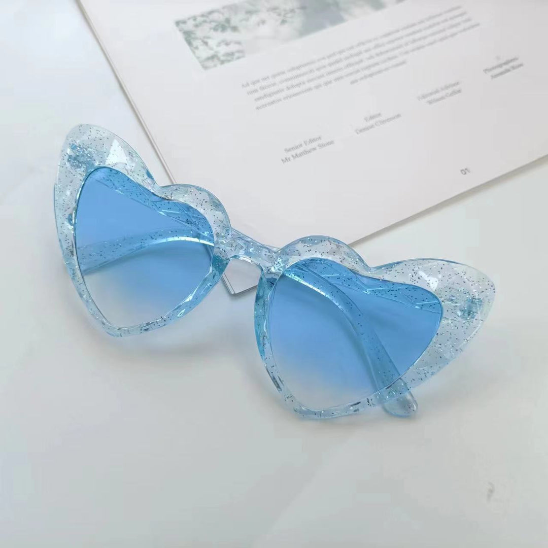 Damen Herzförmige Sonnenbrille mit transparenten Gläsern Karnz