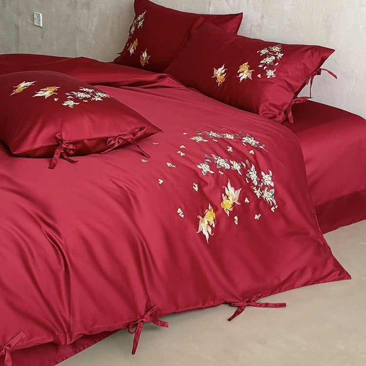 Luxuriöses Satin-Bettwäscheset mit aufwendiger floral-fischiger Stickerei