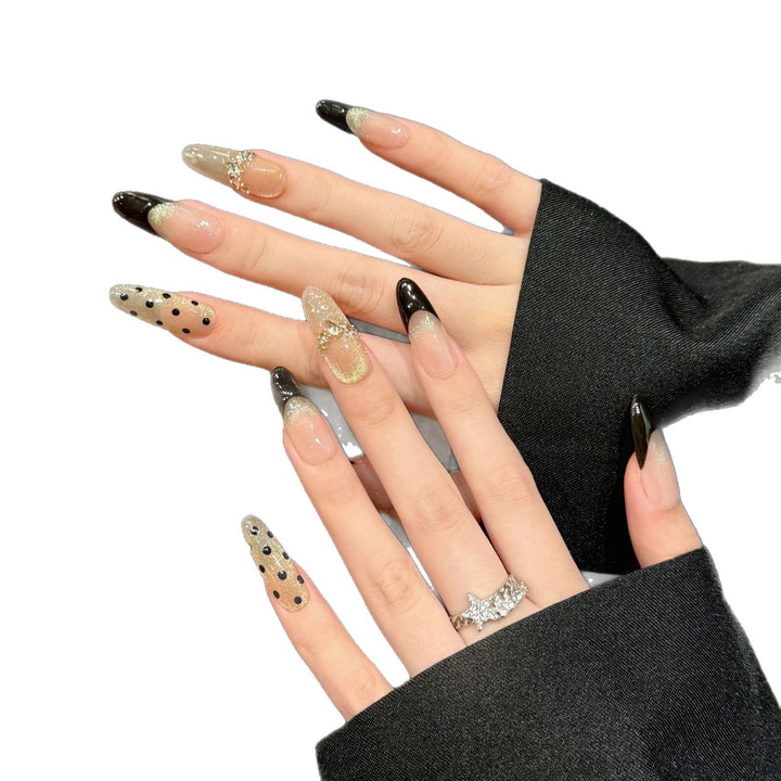 Elegantes Press-On Nagelkunst-Set mit schwarzen und Glitzerakzenten