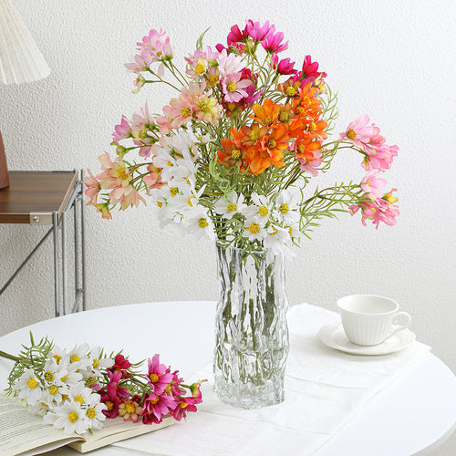 Künstlicher Blütenzweig mit leuchtenden pinken Blumen Karnz