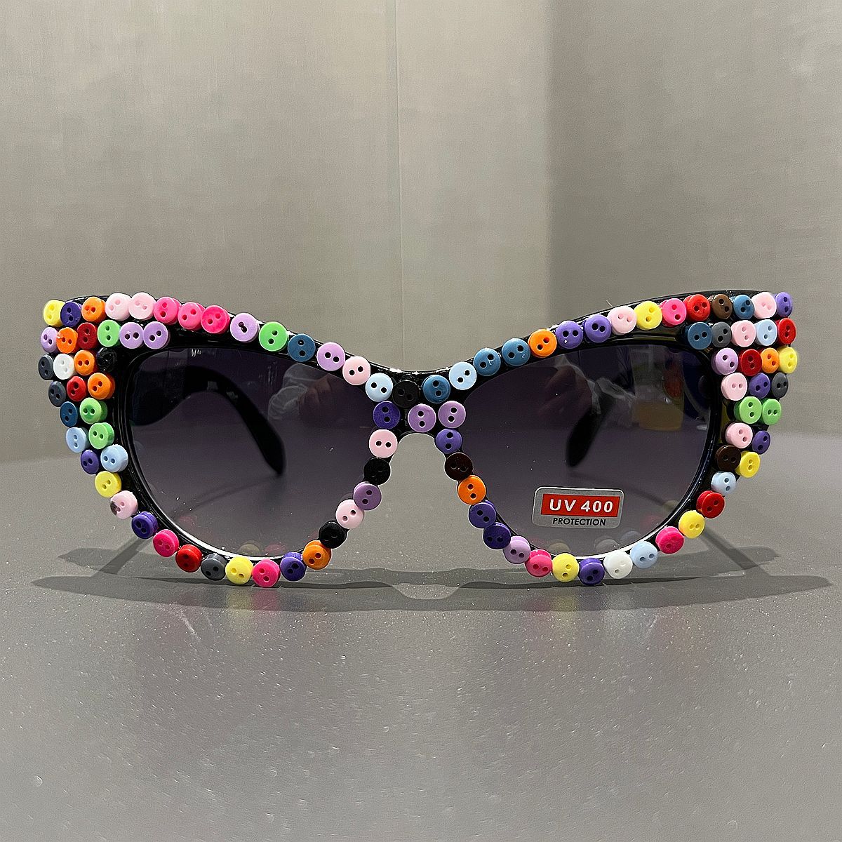 Damen Cat-Eye Sonnenbrille mit farblich akzentuiertem Rahmen Karnz