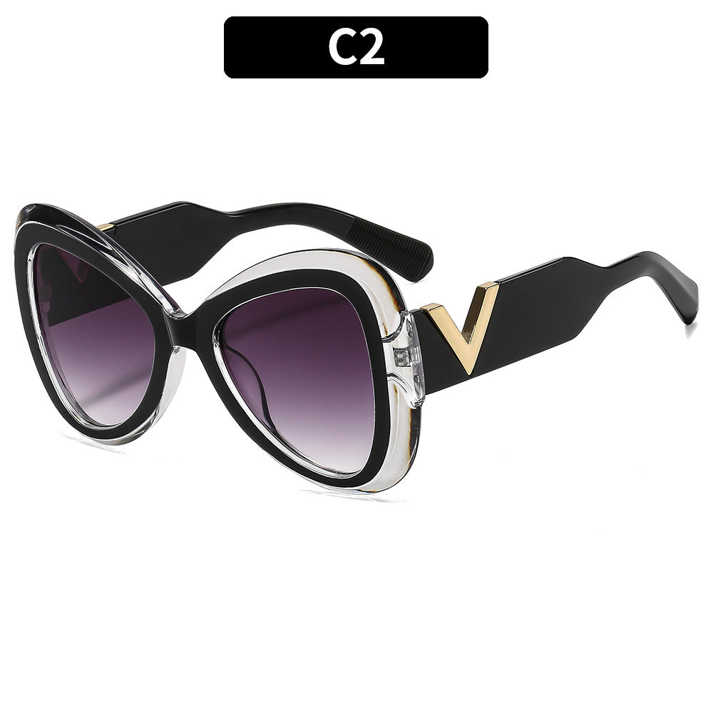 Elegante Cat-Eye-Sonnenbrille mit dekorativem Bügeldesign