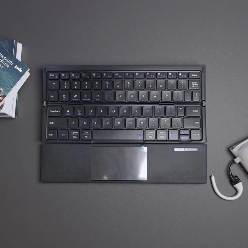 Kompakte kabellose Tastatur mit Touchpad Karnz