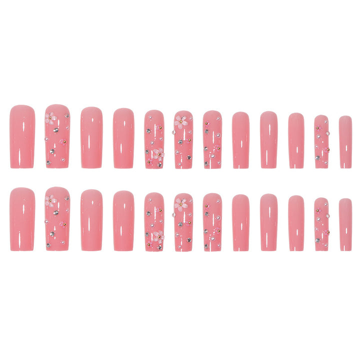 Dekoratives Langes Press-On-Nagelset mit Floralen Akzenten Karnz