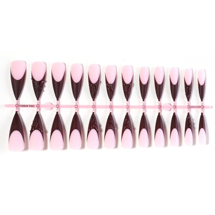 Elegantes Stiletto Press-On-Nagelset mit dekorativem Design Karnz