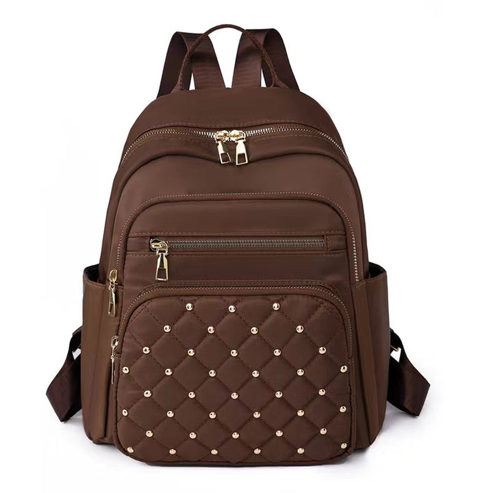 Quilted Rucksack mit dekorativen Nieten Karnz