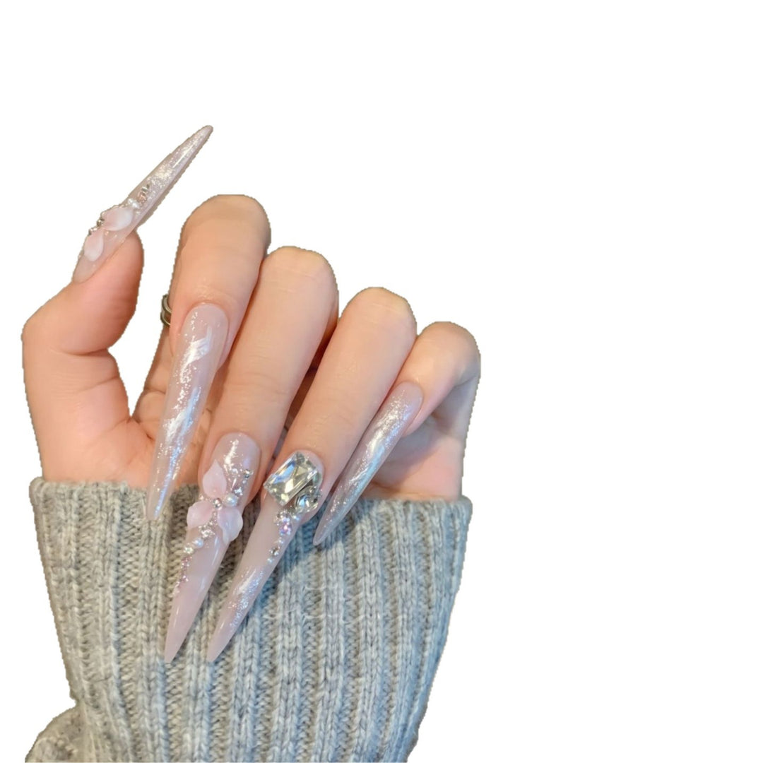 Künstlerisches dekoratives Stiletto Press-On Nagelset mit floralen Akzenten Karnz