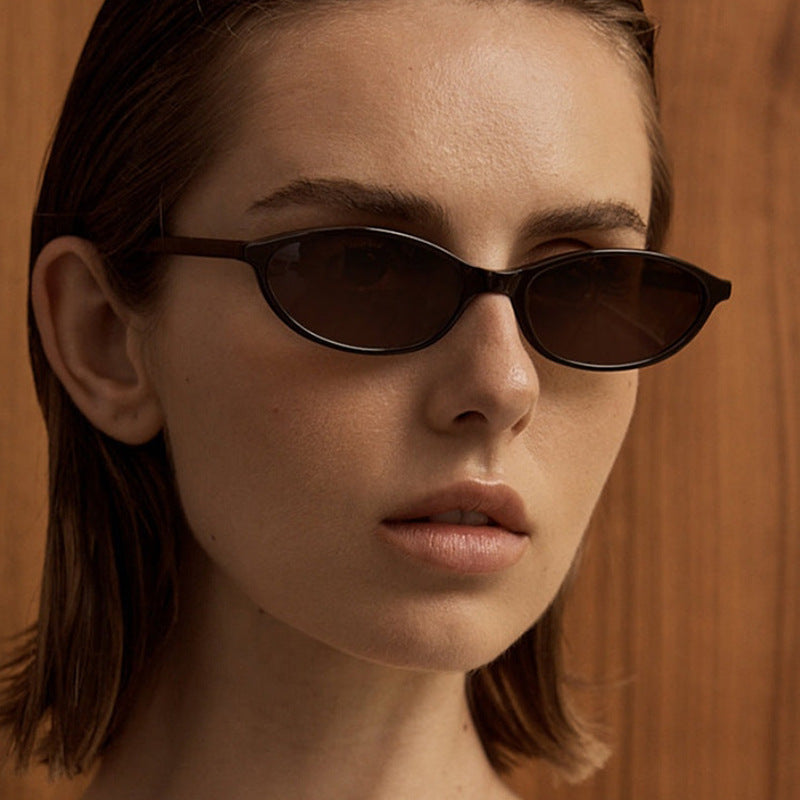 Damen ovalförmige Sonnenbrille mit transparentem Rahmen und UV-Schutz Karnz