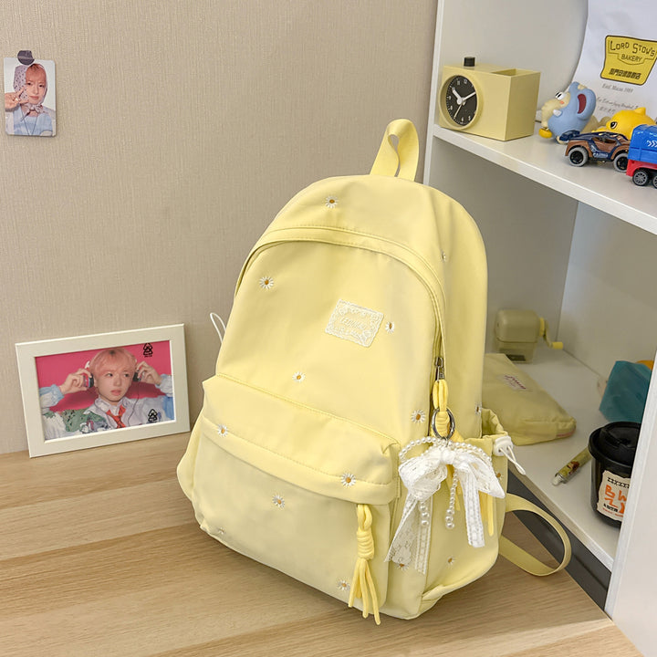 Stylischer backpack mit floralem Schmuck Karnz