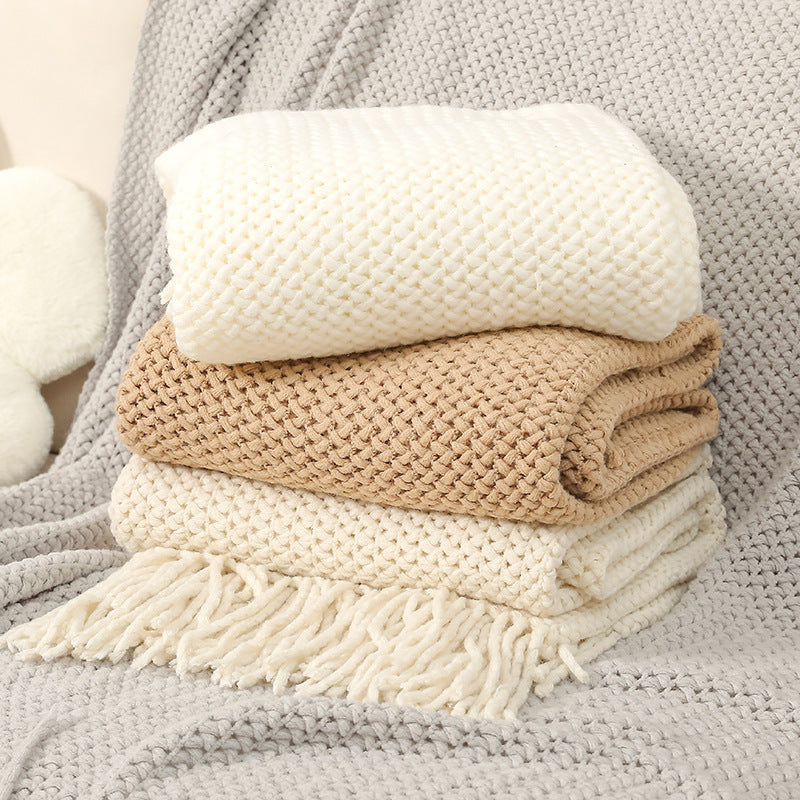 Strukturierte Strickwurfdecke
