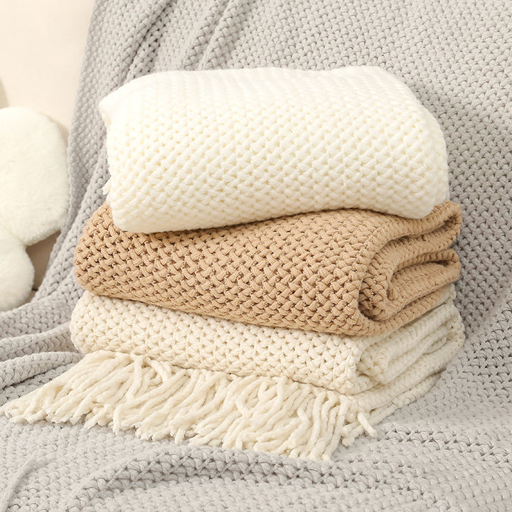 Strukturierte Strickwurfdecke