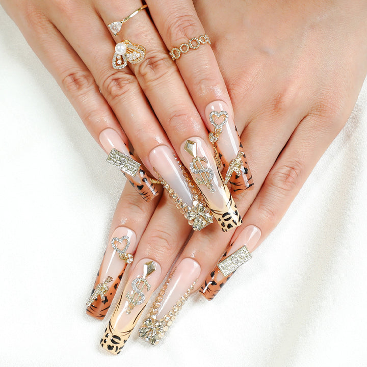 Kunstnagelset mit luxuriösen Glitzer- und Tiermotiven Karnz