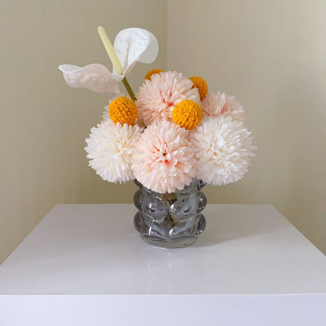 Dekorative künstliche Blumenarrangement