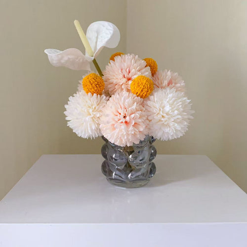 Dekorative künstliche Blumenarrangement