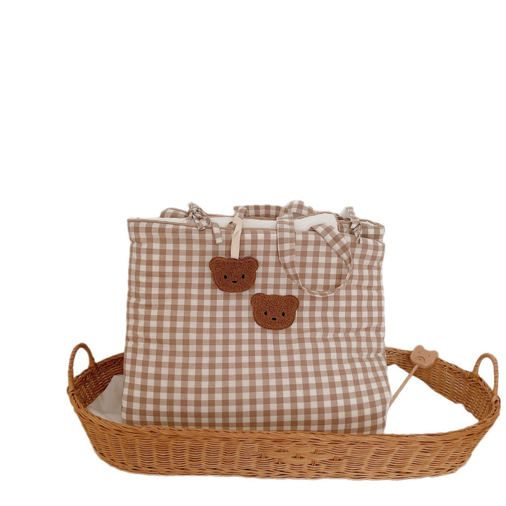 Kinderbett-Nestchen-Set mit Vichy-Karo, gestepptem Matratzenschoner und länglicher Kuschelrolle
