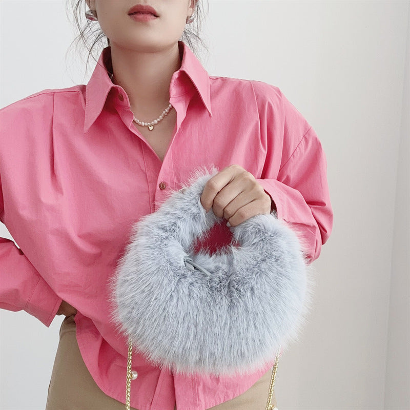 Elegante Faux Fur Rundtasche