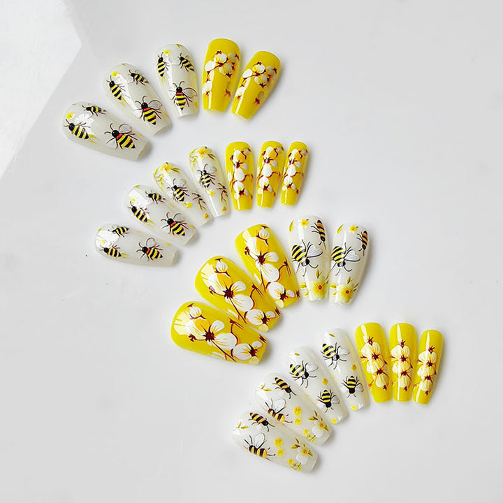 Kunstfingernägel mit Bienen- und Blumenmotiv Karnz