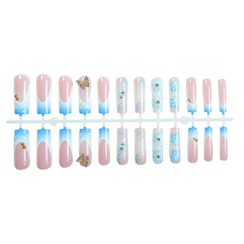 Künstlerisches Press-On-Nagel-Set mit floralen und Schmetterlingsdesigns Karnz