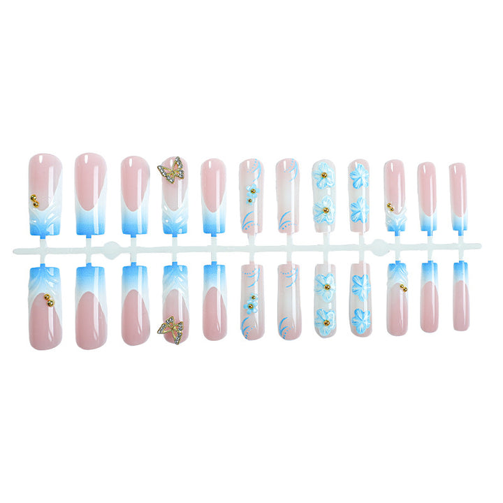 Künstlerisches Press-On-Nagel-Set mit floralen und Schmetterlingsdesigns Karnz