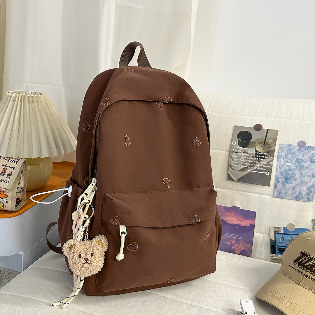 Vielseitiger lässiger Rucksack mit lustigem Charakteranhänger Karnz