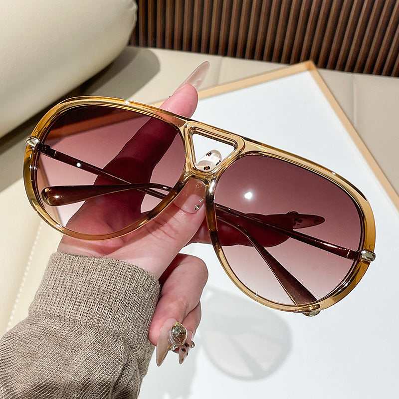 Damen Sonnenbrille im extravagantem Design mit markanten Gläsern Karnz