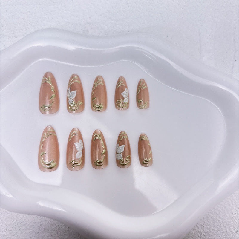 Elegante Kunstnägel mit Marmor- und Goldakzenten Karnz