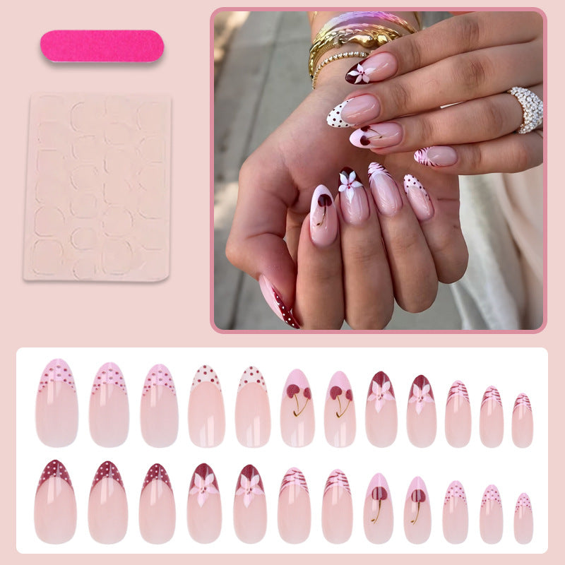 Kunstnagelset mit kreativen Blüten-, Herz- und Polka-Dots-Designs Karnz