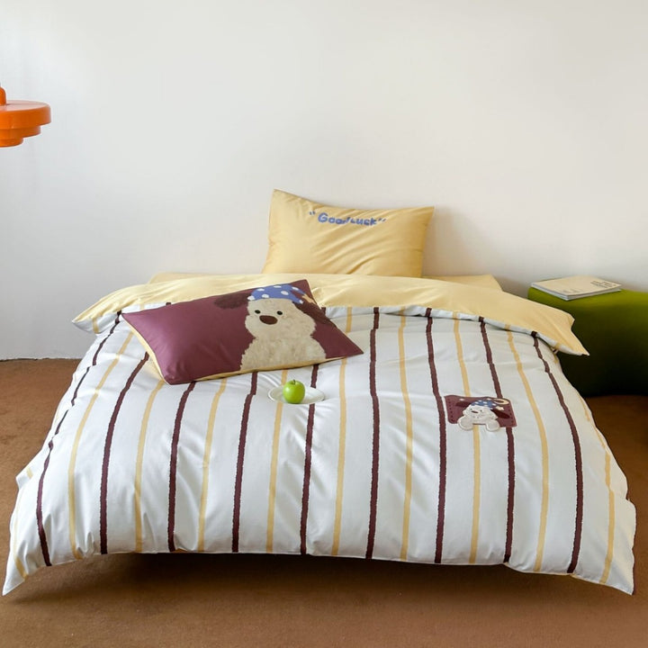 Bettwäsche-Garnitur aus Baumwoll-Satin mit gestreiften und bestickten Tiermotiven