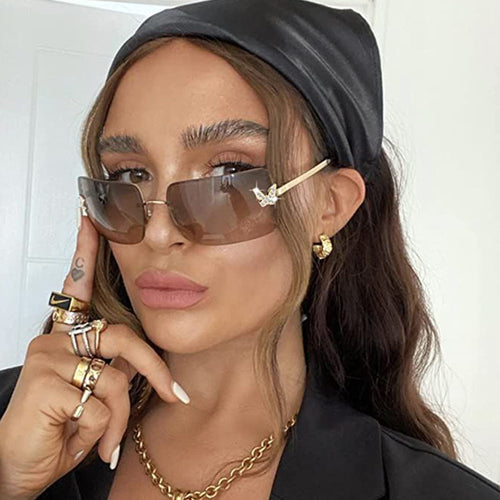 Damen Modische Sonnenbrille mit einzigartigem Rahmen und luxuriösen Akzenten Karnz