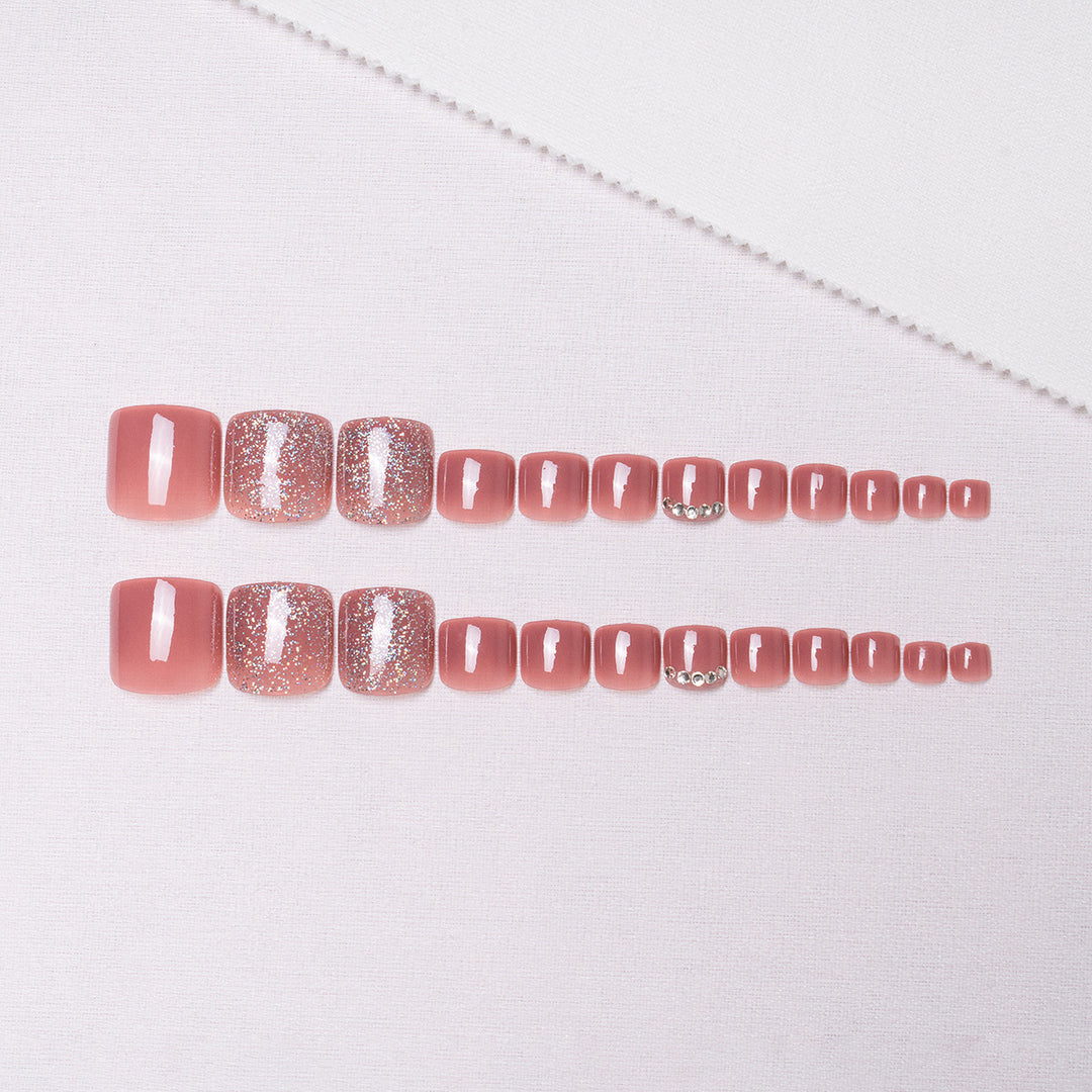 Dekorative Glitzer-Pediküre-Nagelkunst
