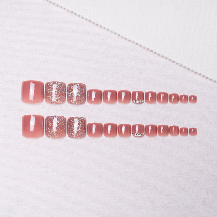 Dekorative Glitzer-Pediküre-Nagelkunst